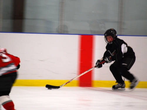 Perfect form with the eyes & head up.  
That defenseman didn't stand a chance against Salgado!